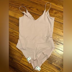 V-neck baby pink bodysuit